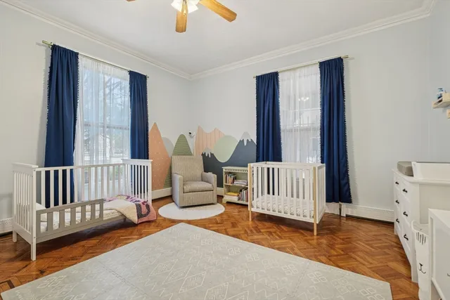 a bedroom with furniture and a window