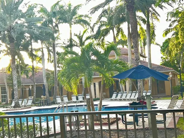 a garden view with a playing court