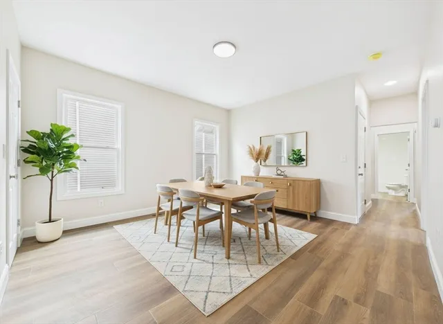 a view of a livingroom with furniture and a table