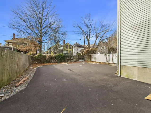 a view of a house with a snow in the yard