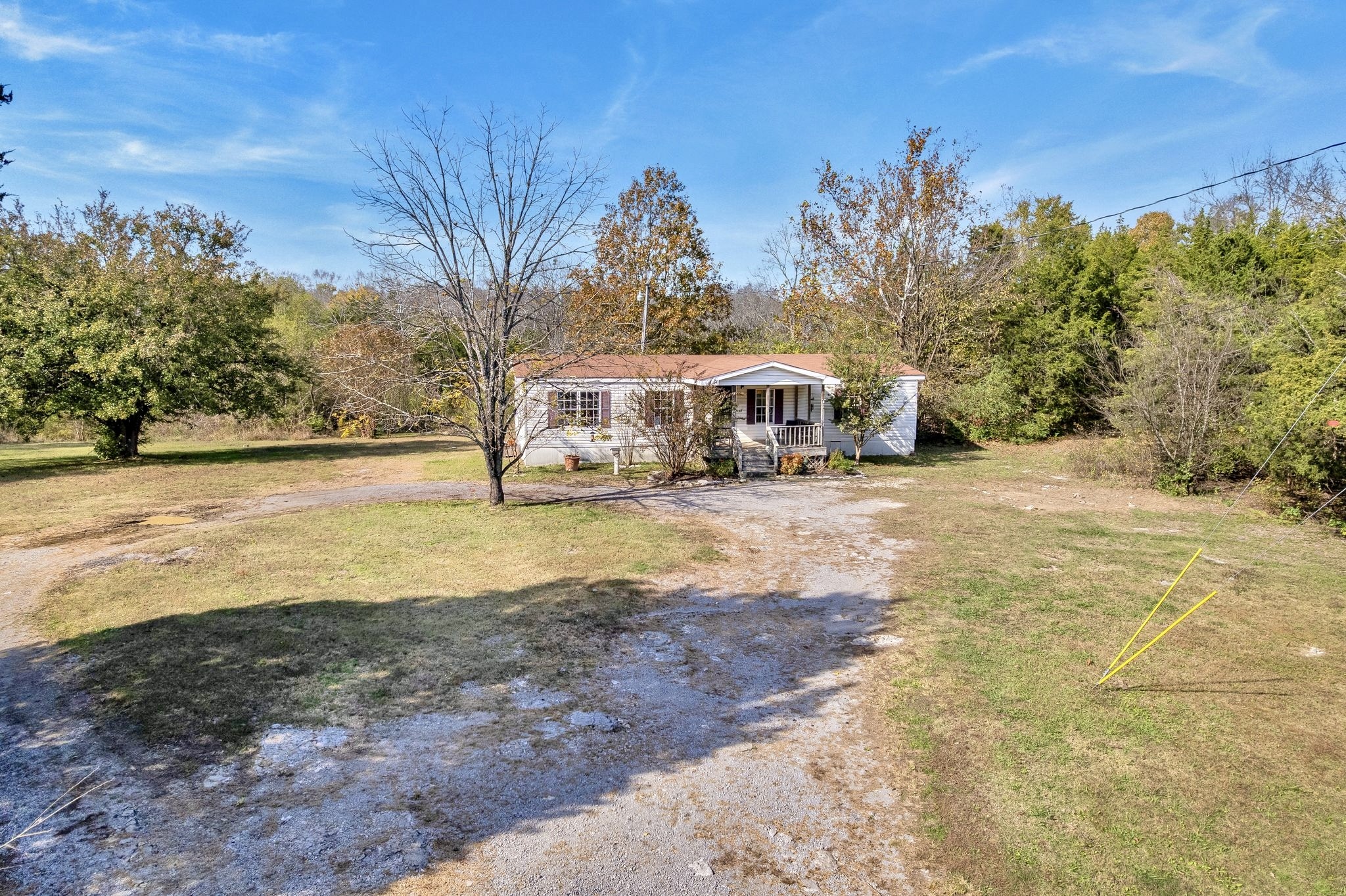 1210 Quarry Road Mount Juliet, TN 37122 - Photo 1 of 40 a view of an ocean with beach and trees in the background