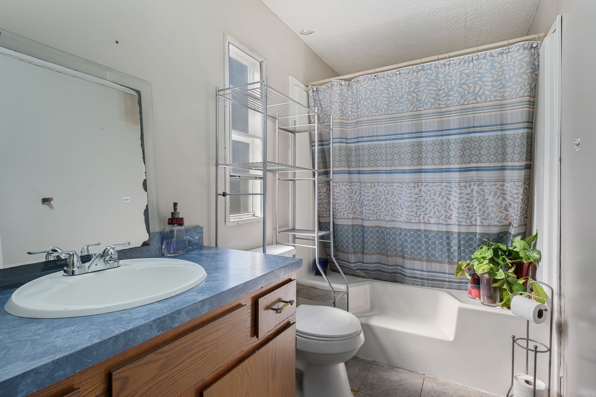 1210 Quarry Road Mount Juliet, TN 37122 - Photo 23 of 40 a bathroom with a sink toilet and shower