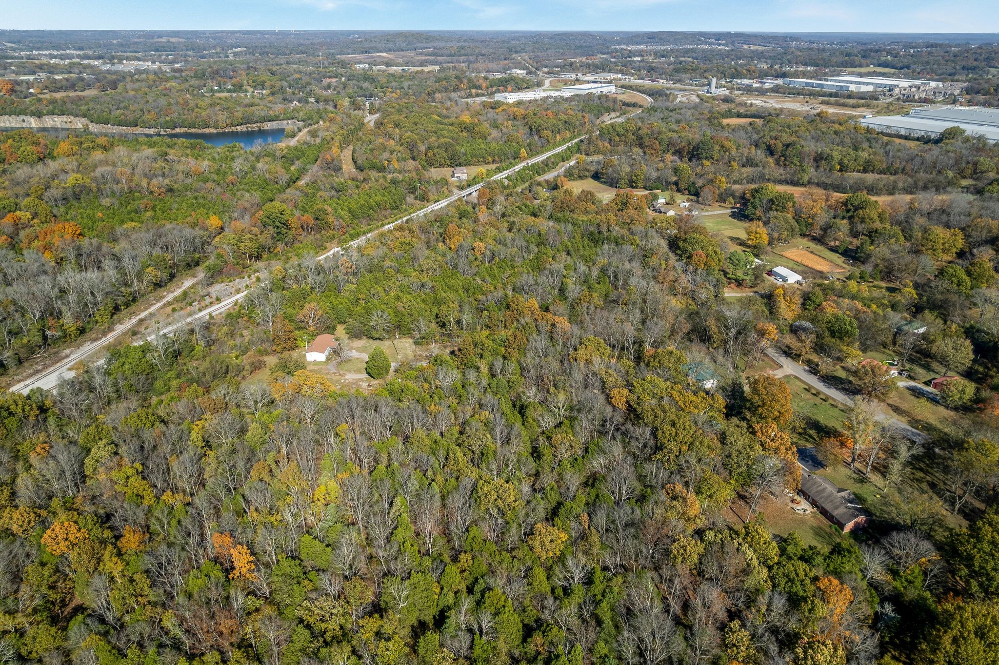 1210 Quarry Road Mount Juliet, TN 37122 - Photo 33 of 40 an aerial view of residential houses with outdoor space and trees