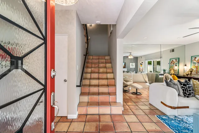 a view of entryway with wooden floor