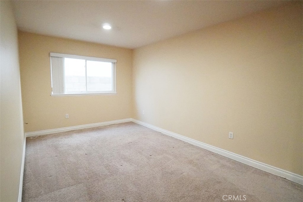 14722 Comet Street Irvine, CA 92604 - Photo 13 of 22 an empty room with a window
