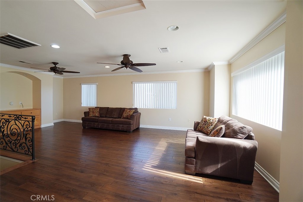 14722 Comet Street Irvine, CA 92604 - Photo 15 of 22 a living room with furniture and a window
