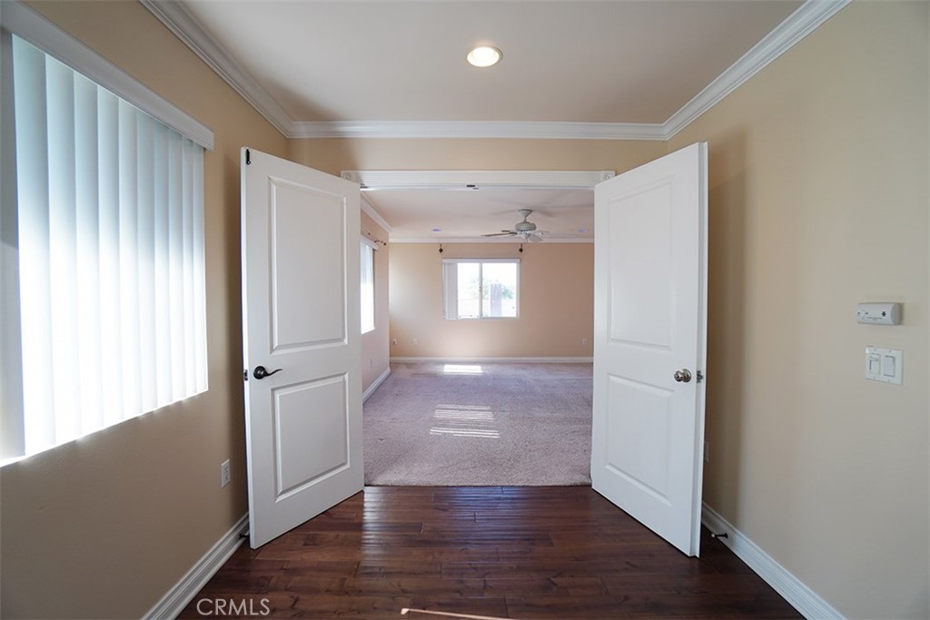 14722 Comet Street Irvine, CA 92604 - Photo 16 of 22 wooden floor in an empty room with a window