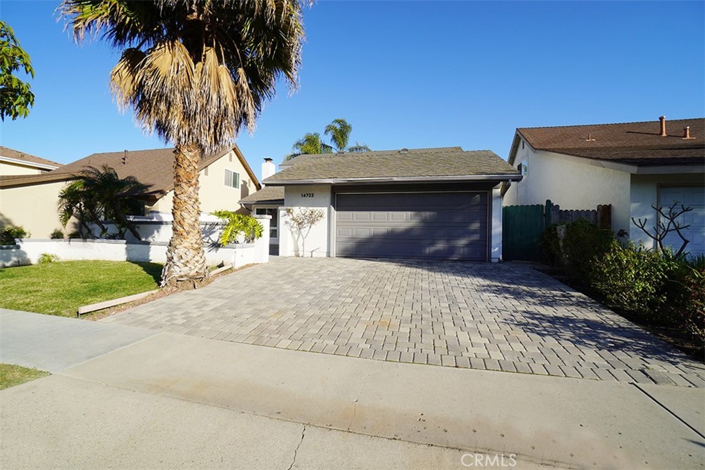 14722 Comet Street Irvine, CA 92604 - Photo 2 of 22 front view of a house with a yard