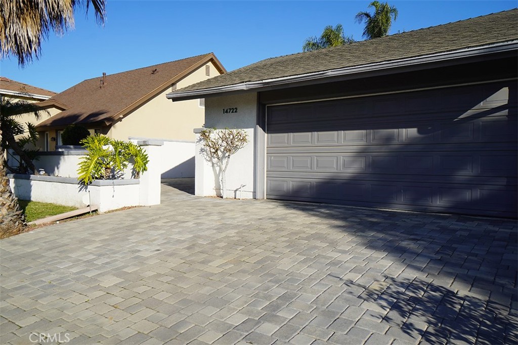 14722 Comet Street Irvine, CA 92604 - Photo 3 of 22 a view of back yard of a house