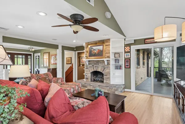 a kitchen with stainless steel appliances granite countertop a sink stove microwave and cabinets
