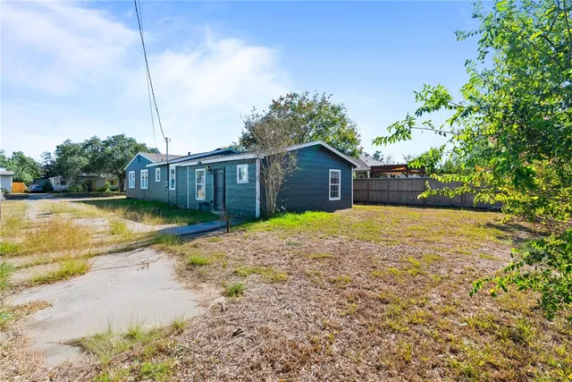 a house view with a swimming pool