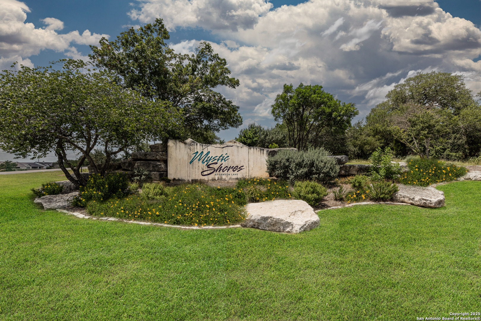525 Rock Trail Place Spring Branch, TX 78070 - Photo 12 of 22 a front view of a house with garden