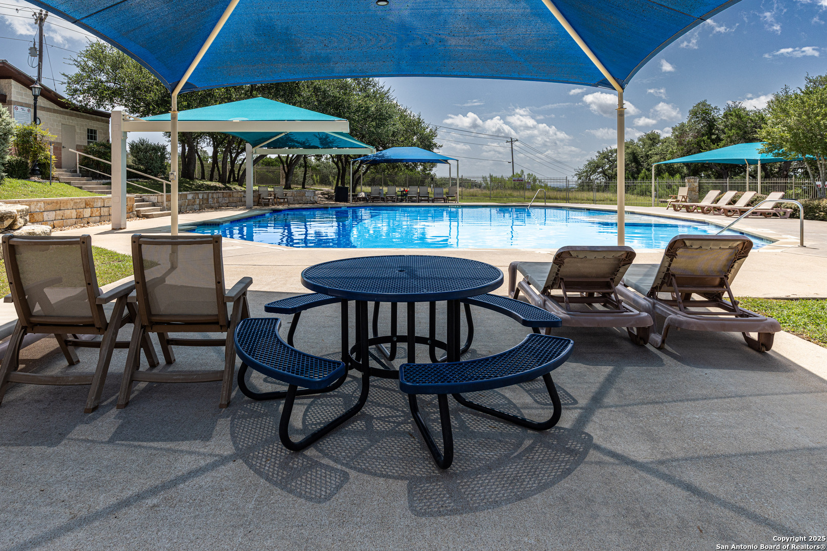 525 Rock Trail Place Spring Branch, TX 78070 - Photo 15 of 22 a view of a patio with swimming pool table and chairs