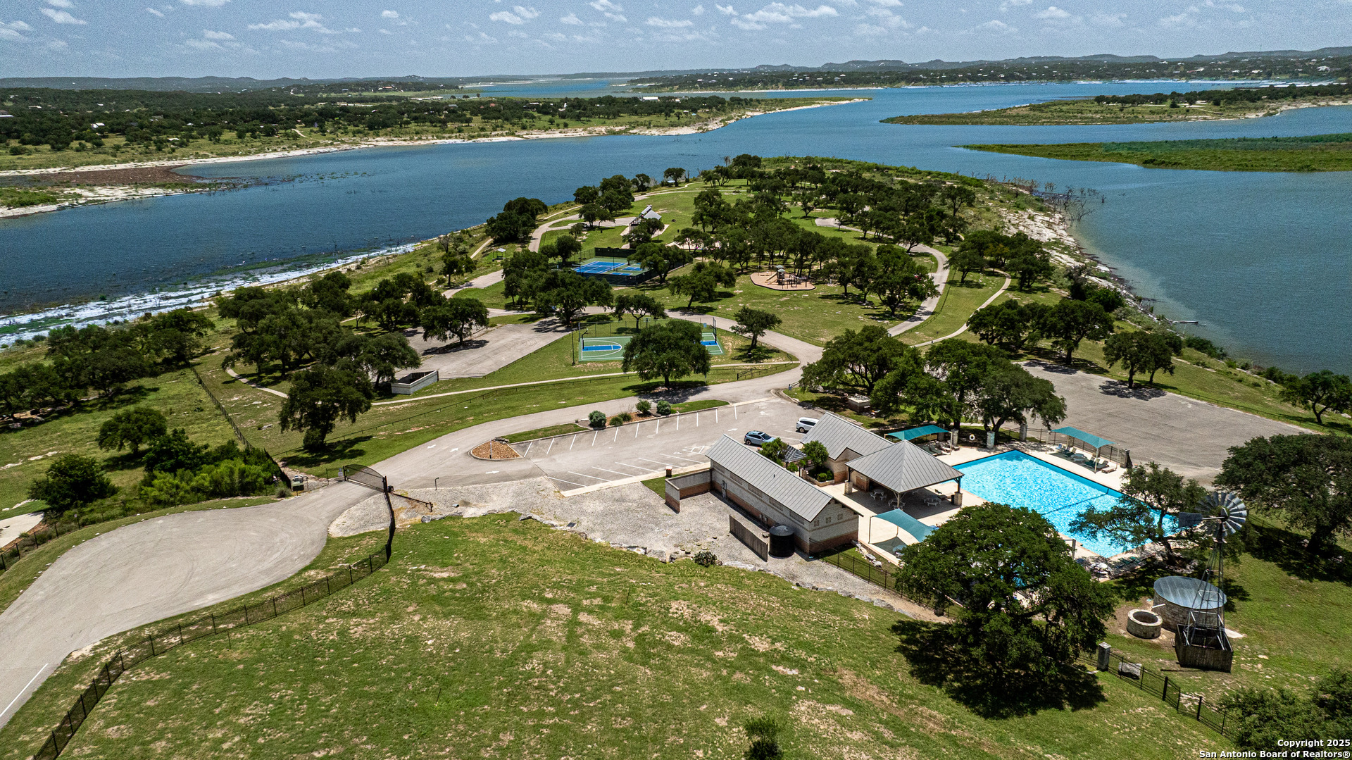 525 Rock Trail Place Spring Branch, TX 78070 - Photo 20 of 22 an aerial view of a house with a lake view
