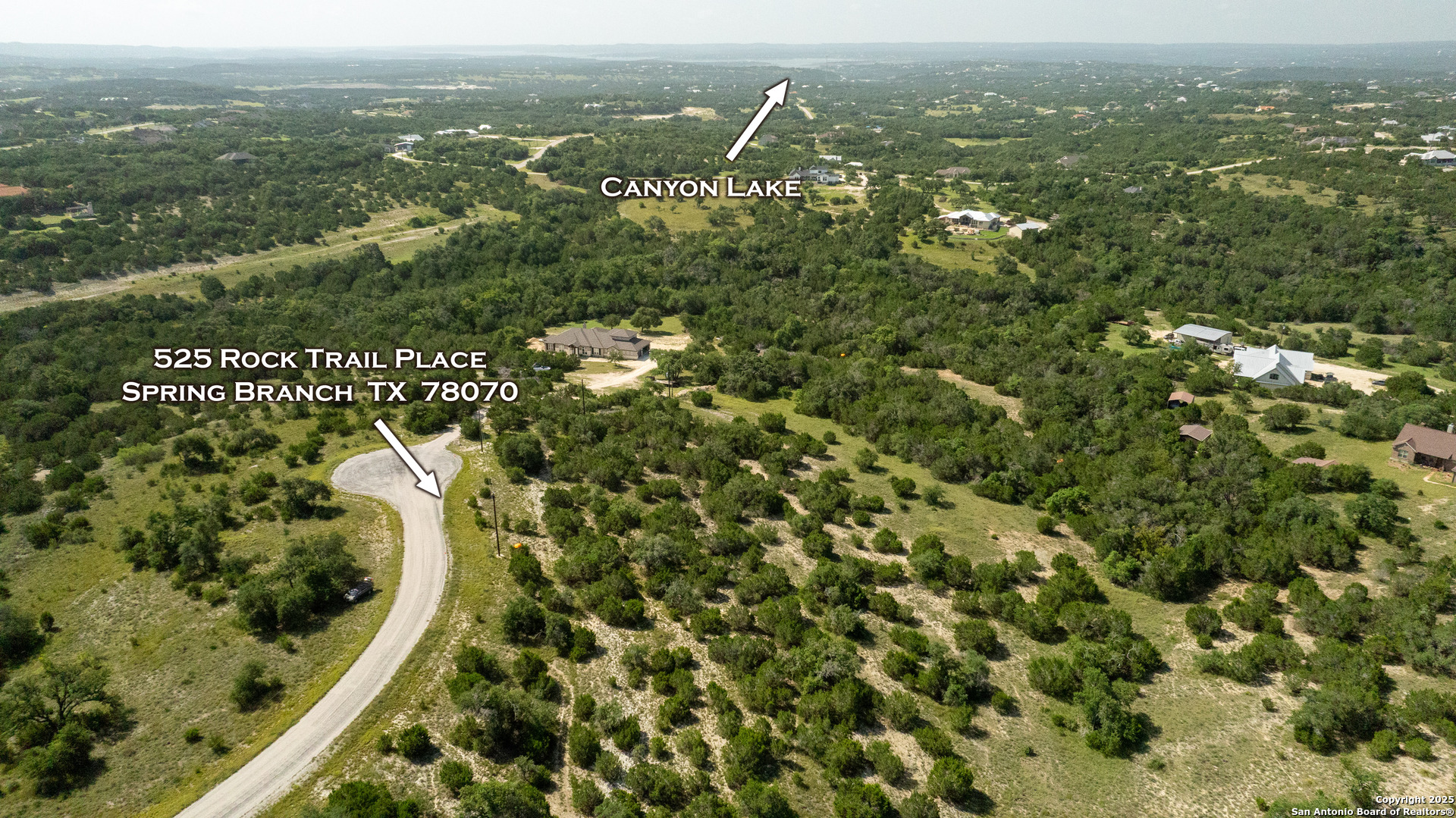 525 Rock Trail Place Spring Branch, TX 78070 - Photo 3 of 22 an aerial view of residential houses with outdoor space and trees