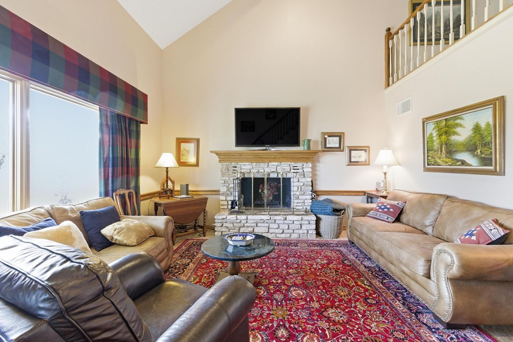 125 West Mauk Road Ingram, TX 78025 - Photo 37 of 45 Living room with wood fireplace