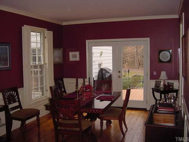11612 Appaloosa Run West Raleigh, NC 27613 - Photo 3 of 12 a view of a dining room with furniture and chandelier