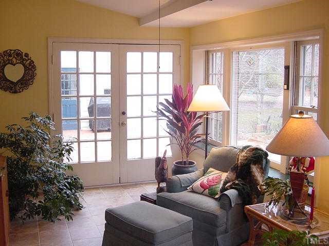 11612 Appaloosa Run West Raleigh, NC 27613 - Photo 6 of 12 a living room with furniture and a window