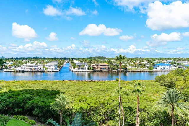 a view of balcony with floor to ceiling window and wooden floor