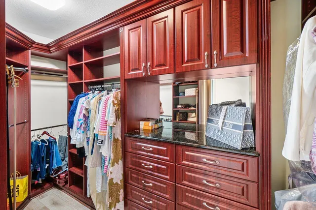 a dining room with furniture and chandelier