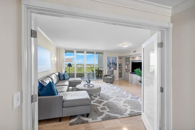 a living room with furniture and a table