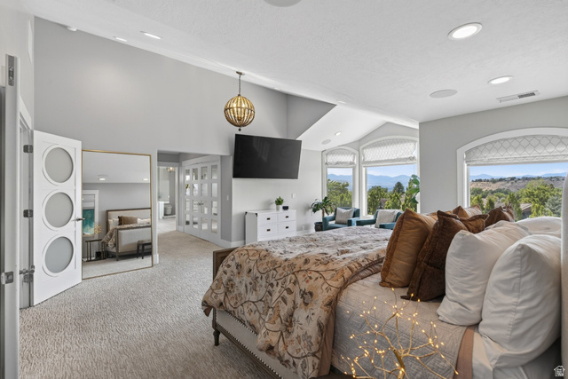 12308 Mariah Circle Draper, UT 84020 - Photo 59 of 293 Vaulted ceilings complement arched windows with custom window treatments