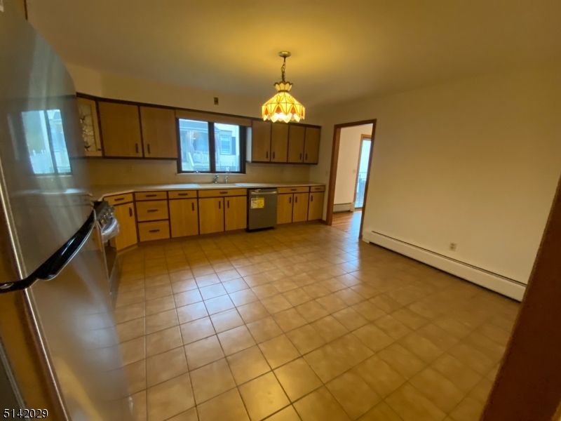 141 Prospect Street Nutley, NJ 07110 - Photo 7 of 18 a view of a kitchen with a sink