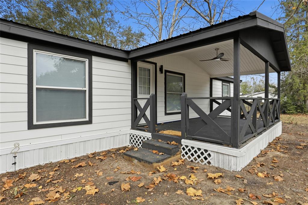 9024 Southwest 104th Terrace Gainesville, FL 32608 - Photo 17 of 21 a view of entryway with a bench
