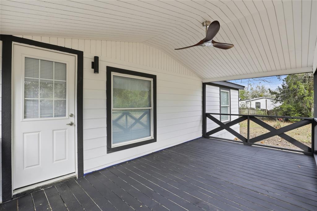 9024 Southwest 104th Terrace Gainesville, FL 32608 - Photo 18 of 21 a view of a livingroom with furniture and hardwood floor
