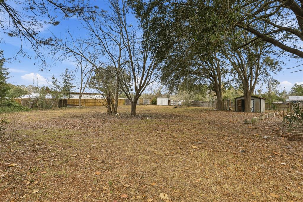 9024 Southwest 104th Terrace Gainesville, FL 32608 - Photo 7 of 21 a view of open space with yard