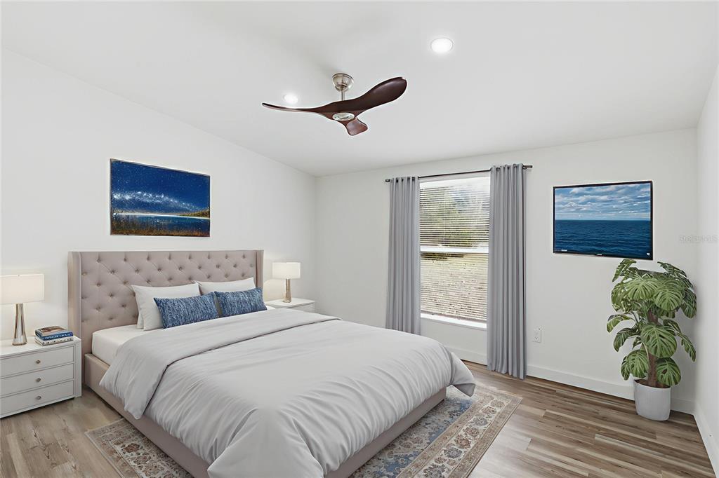 9024 Southwest 104th Terrace Gainesville, FL 32608 - Photo 10 of 21 a bedroom with a bed and a window