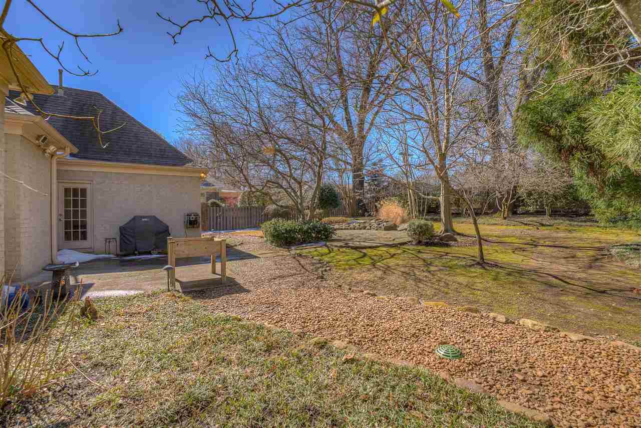 35 West Carlos Road Memphis, TN 38117 - Photo 22 of 24 Professionally landscaped with plenty of room to add outdoor living space or a pool.