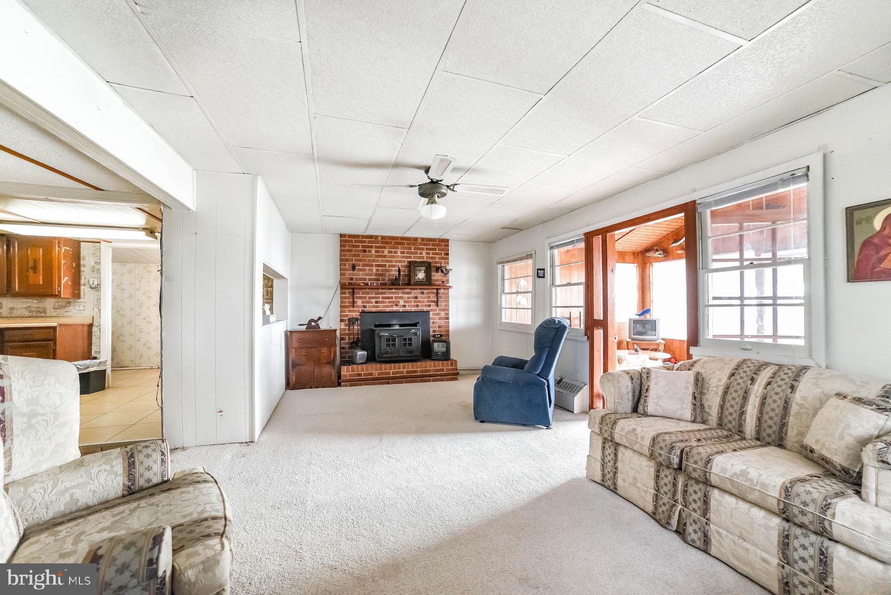 38455 Bayview Road Coltons Point, MD 20626 - Photo 22 of 77 Family room with wood stove