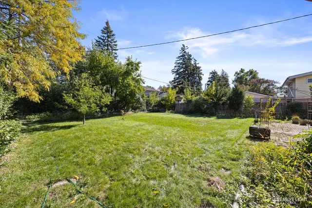 a view of a yard with an outdoor space