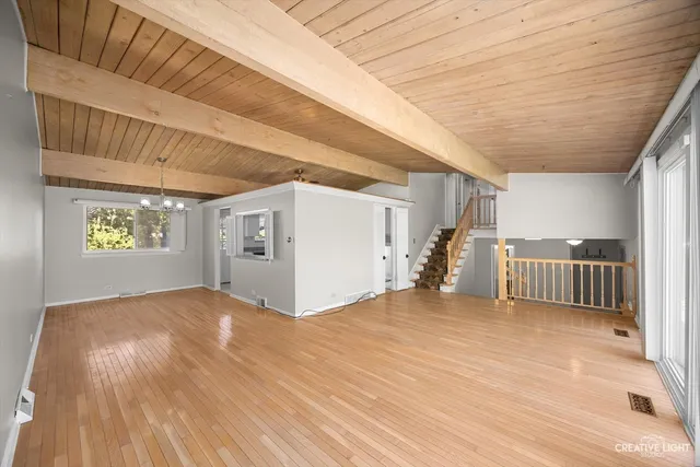 a view of a livingroom with a staircase