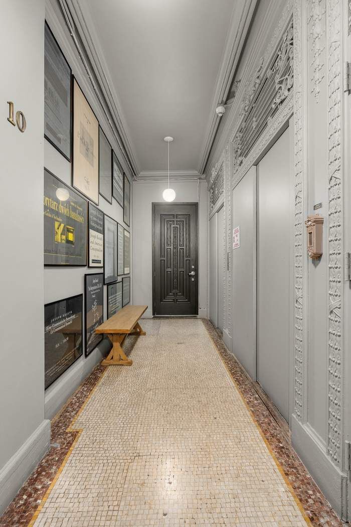 50 Pine Street, Unit 10 Manhattan, NY 10005 - Photo 5 of 14 a view of an entryway with a hallway
