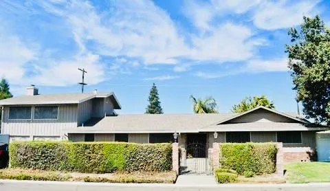 a car parked in front of a house