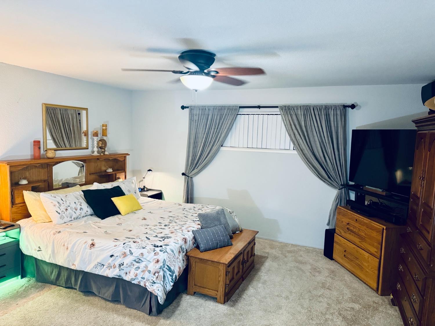 3109 Fredericksburg Way Modesto, CA 95355 - Photo 12 of 32 a bedroom with a bed and wooden floor