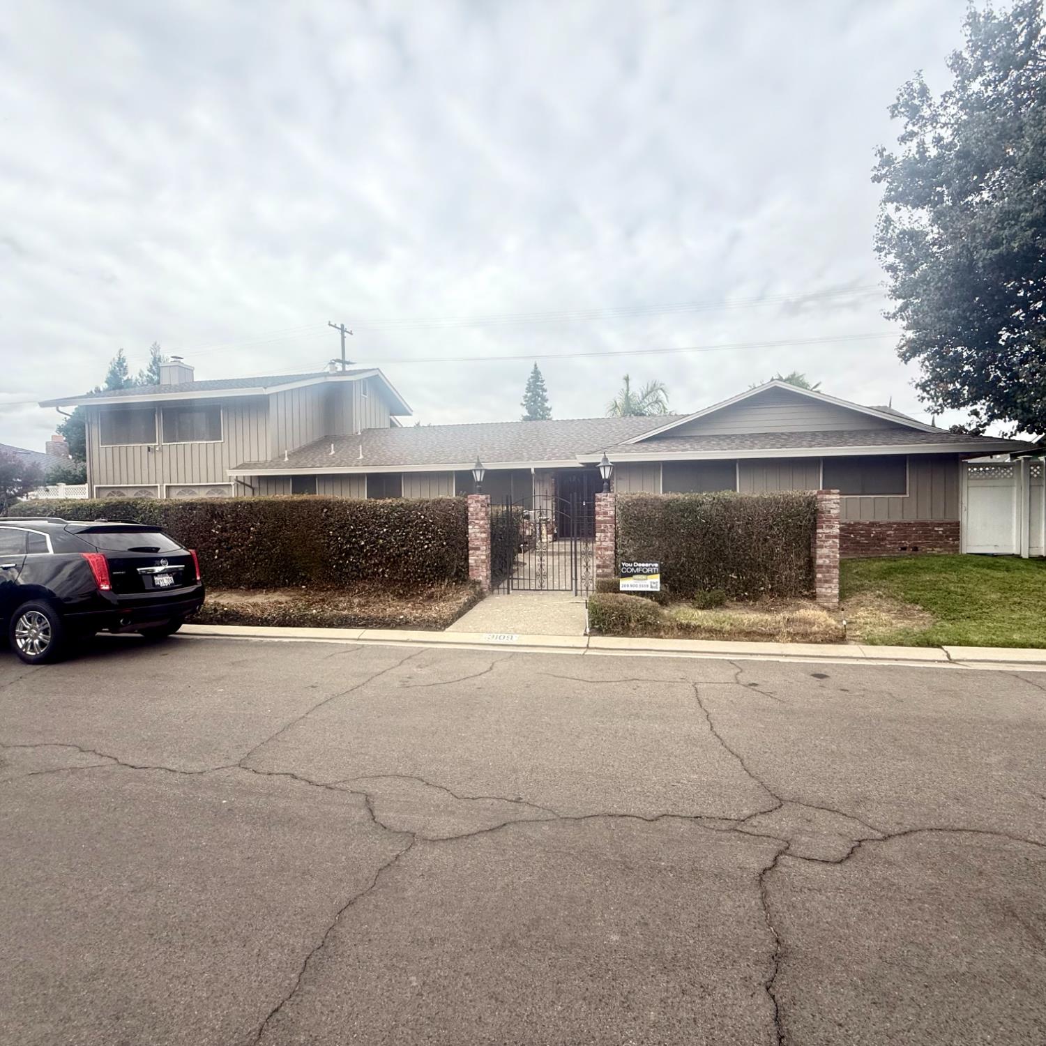 3109 Fredericksburg Way Modesto, CA 95355 - Photo 2 of 32 a car parked in front of a house