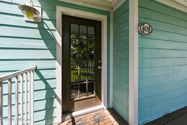 a view of entryway with a front door