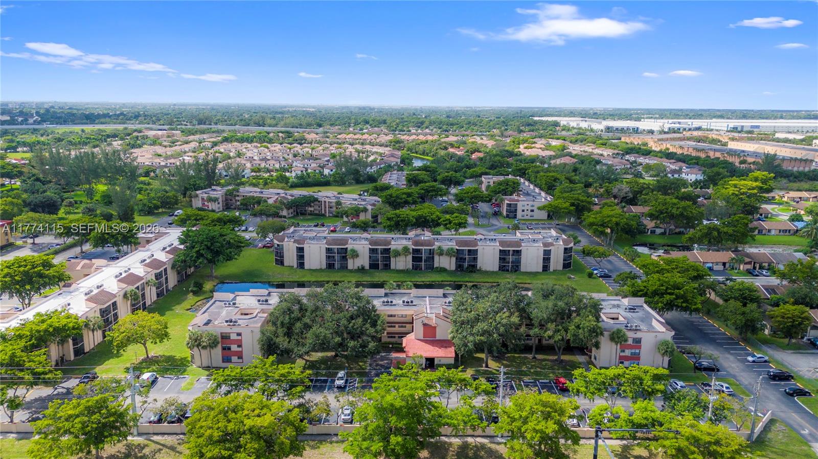 3199 Foxcroft Road, Unit 311 Miramar, FL 33025 - Photo 12 of 18 an aerial view of multiple house