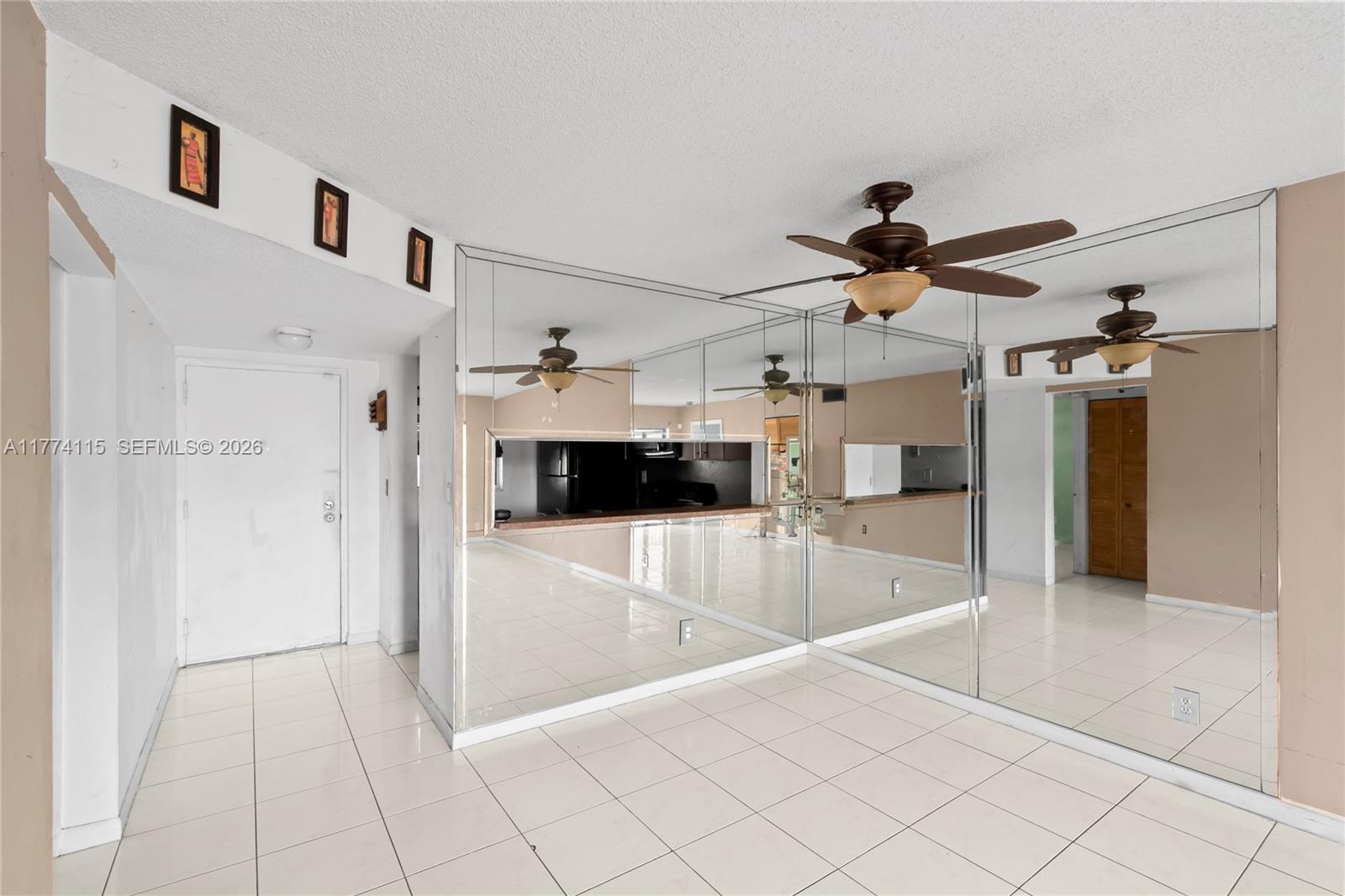 3199 Foxcroft Road, Unit 311 Miramar, FL 33025 - Photo 5 of 18 a view of a bathroom with a tub and mirror