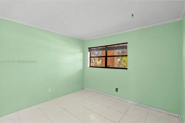 a view of an empty room with window