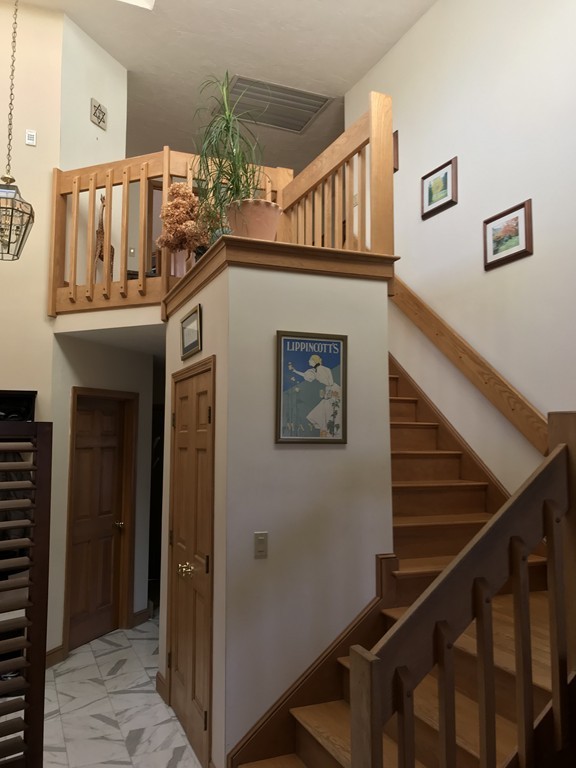 38 Kettle Hole Road Bolton, MA 01740 - Photo 8 of 28 a view of entryway and hall with wooden floor