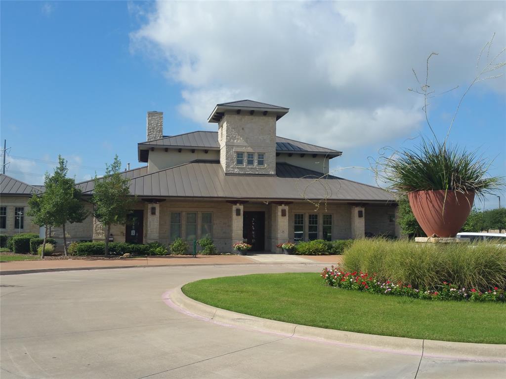 862 Mildren Lane Fate, TX 75087 - Photo 34 of 40 Living Here Means Enjoying the Unparalleled Lifestyle of the Woodcreek Community with Amenities Including a Fully Equipped Clubhouse available for Large Events or Parties, Fitness Center, Splash Park, Two Pools, Cabanas, Basketball Courts, Two Dog Parks, Playground, Soccer Field, Pond, Outdoor Kitchen, Putting Green, Walking Trails and More.