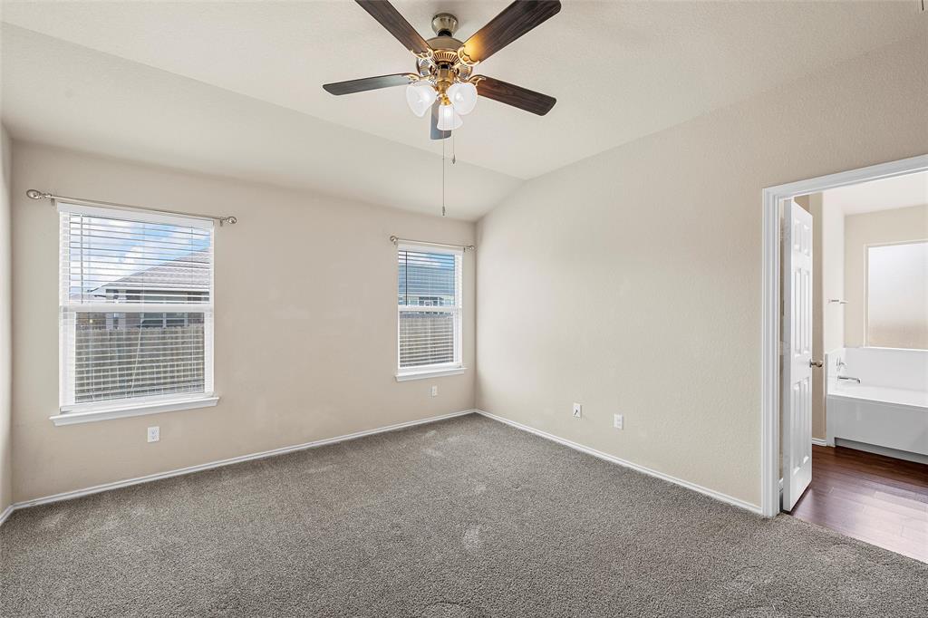 3217 Beutel Road Lorena, TX 76655 - Photo 18 of 40 Unfurnished room with carpet, ceiling fan, and lofted ceiling