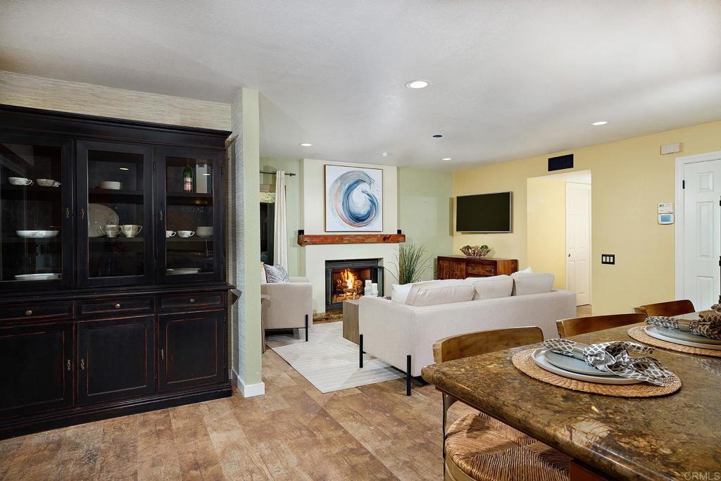 1323 Calle Scott Encinitas, CA 92024 - Photo 13 of 28 a living room with furniture and a fireplace