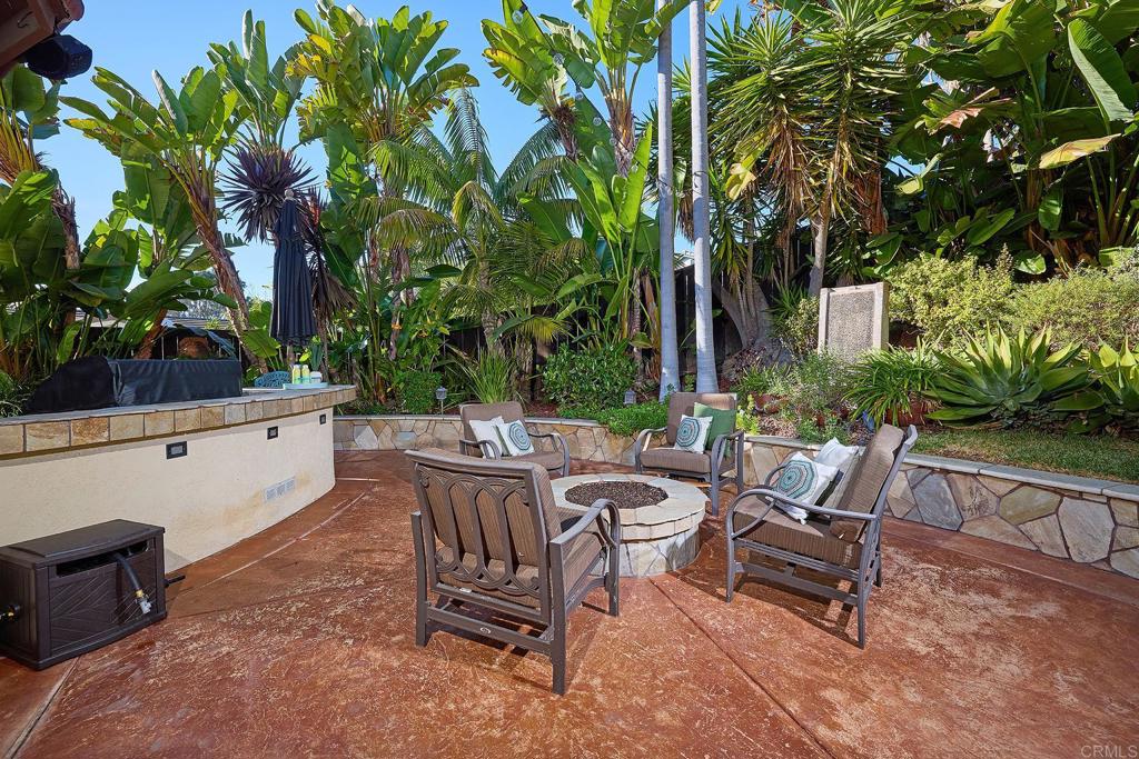 1323 Calle Scott Encinitas, CA 92024 - Photo 27 of 28 a view of backyard with outdoor seating and plants