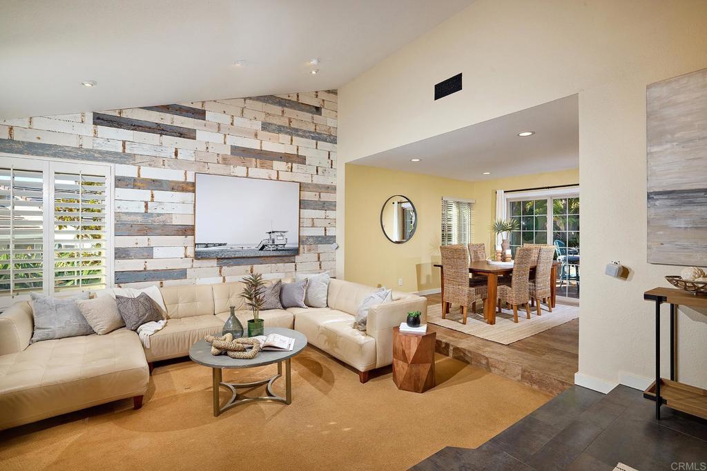 1323 Calle Scott Encinitas, CA 92024 - Photo 6 of 28 a living room with furniture and a large window
