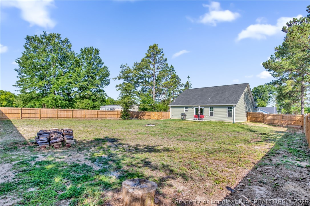 351 Sandy Grove Road Parkton, NC 28371 - Photo 26 of 30 a view of a house with a yard